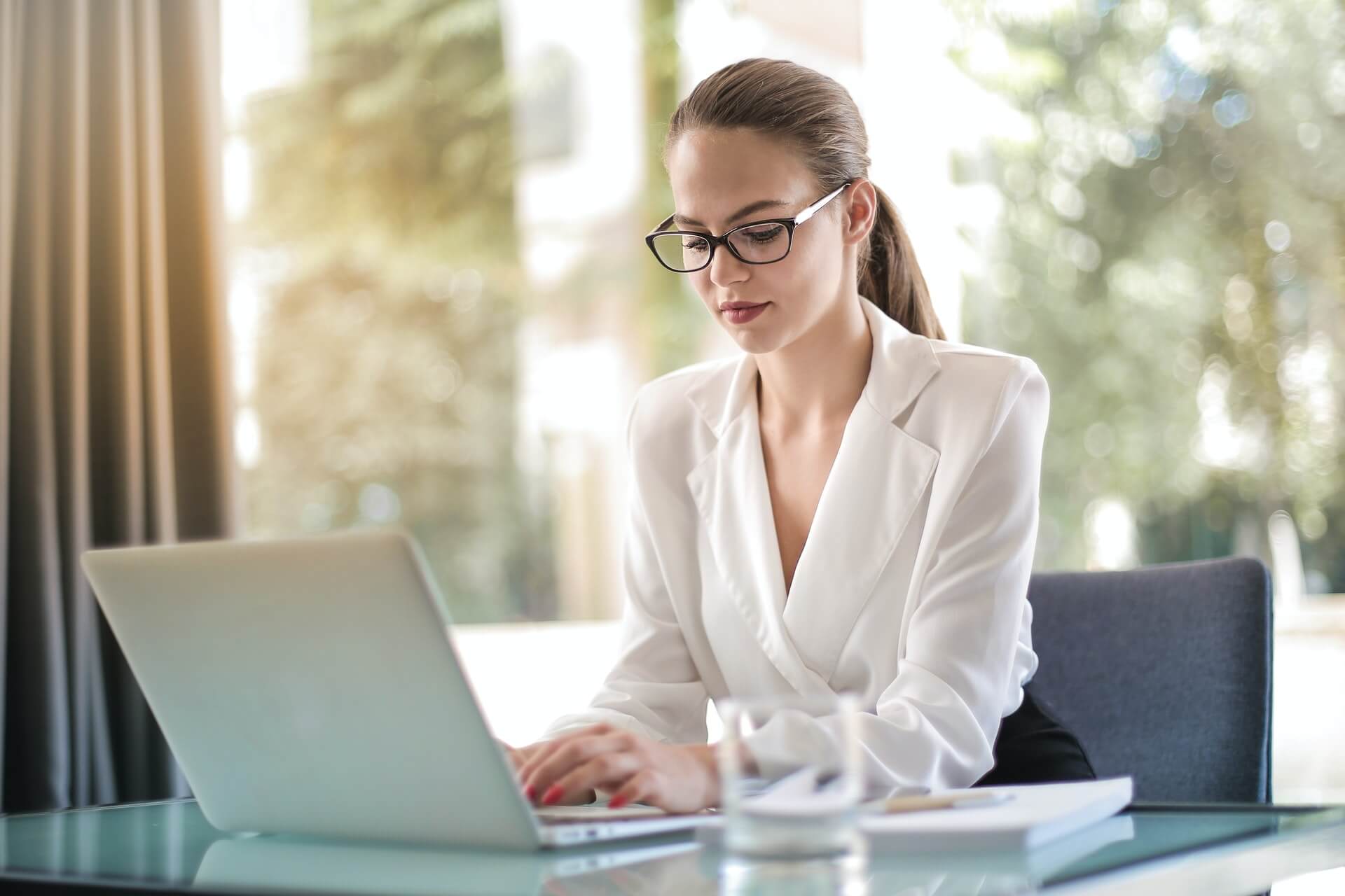 Woman searching how to add chatbox to website html.