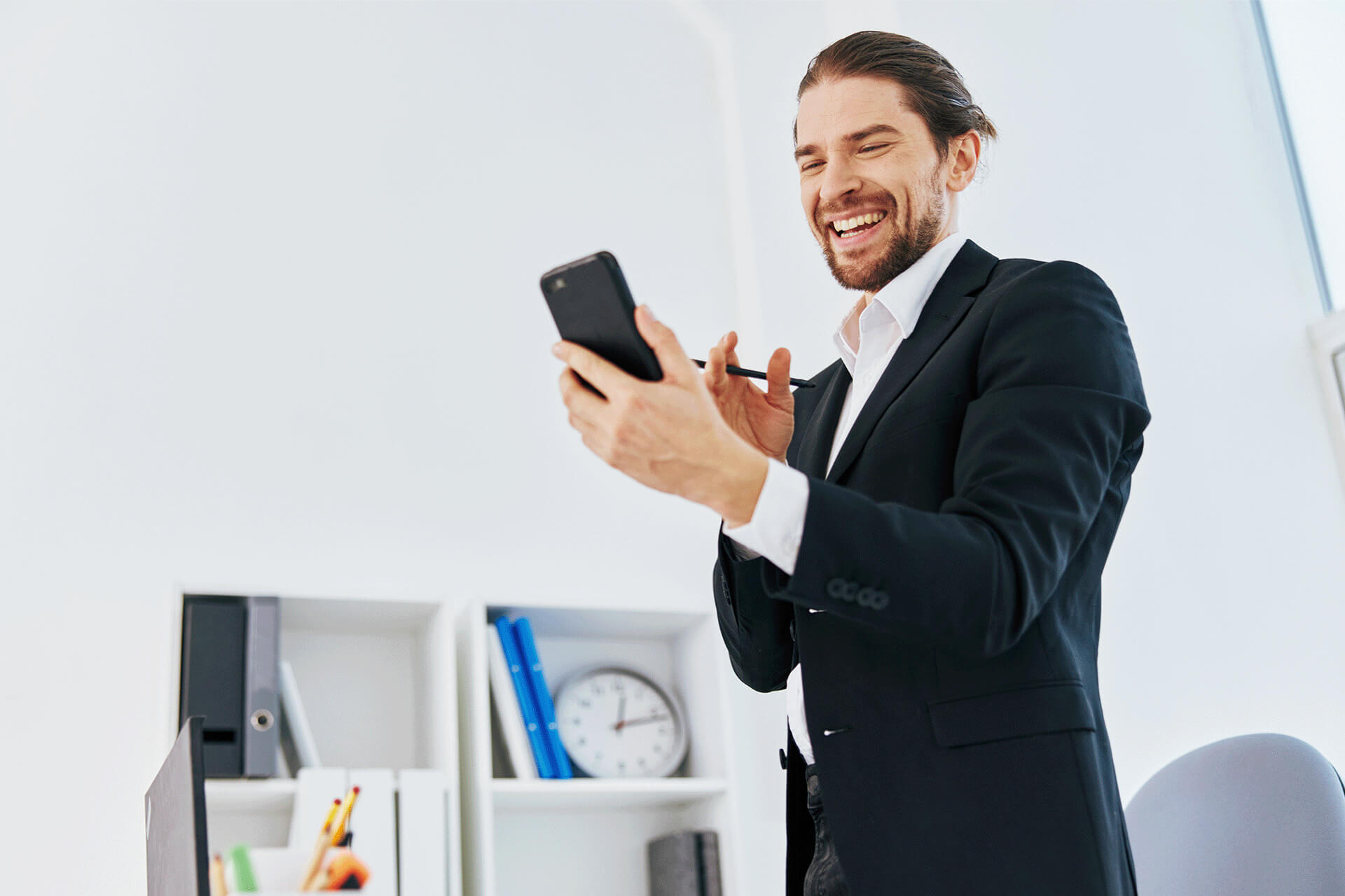 Man using live chat on mobile device Man using live chat on mobile device