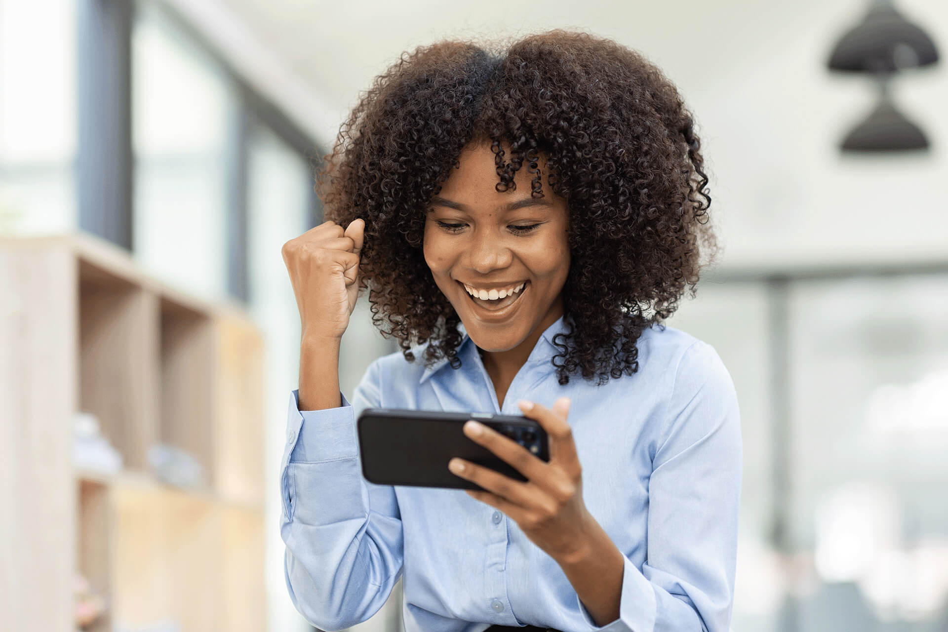 Woman using live chat system on mobile device Woman using live chat system on mobile device