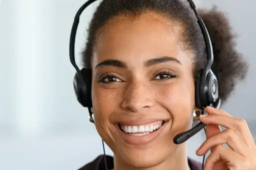 A customer service agent with a headset