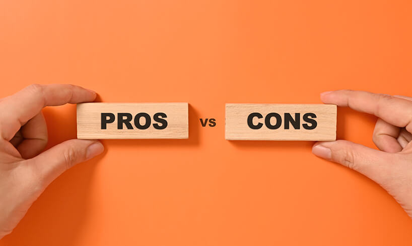 pros and cons text on wooden blocks